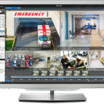 Surveillance command center software interface displaying live multi-camera feeds, timeline playback, site maps, and emergency alerts on a professional monitoring station — Apollo Technology & Cabling