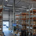 Warehouse with structured cabling, cameras, wireless access points, and network infrastructure